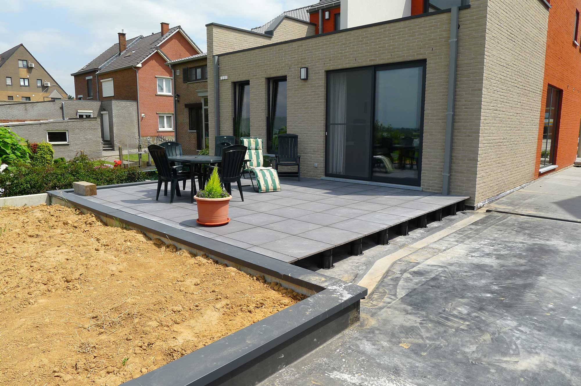 Chantier d'une maison de particulier en dalles sur plots Buzon